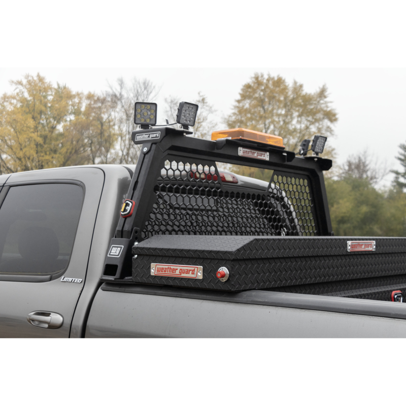 Weather guard tool box installed by pro fleet upfitters in the bed of a truck 