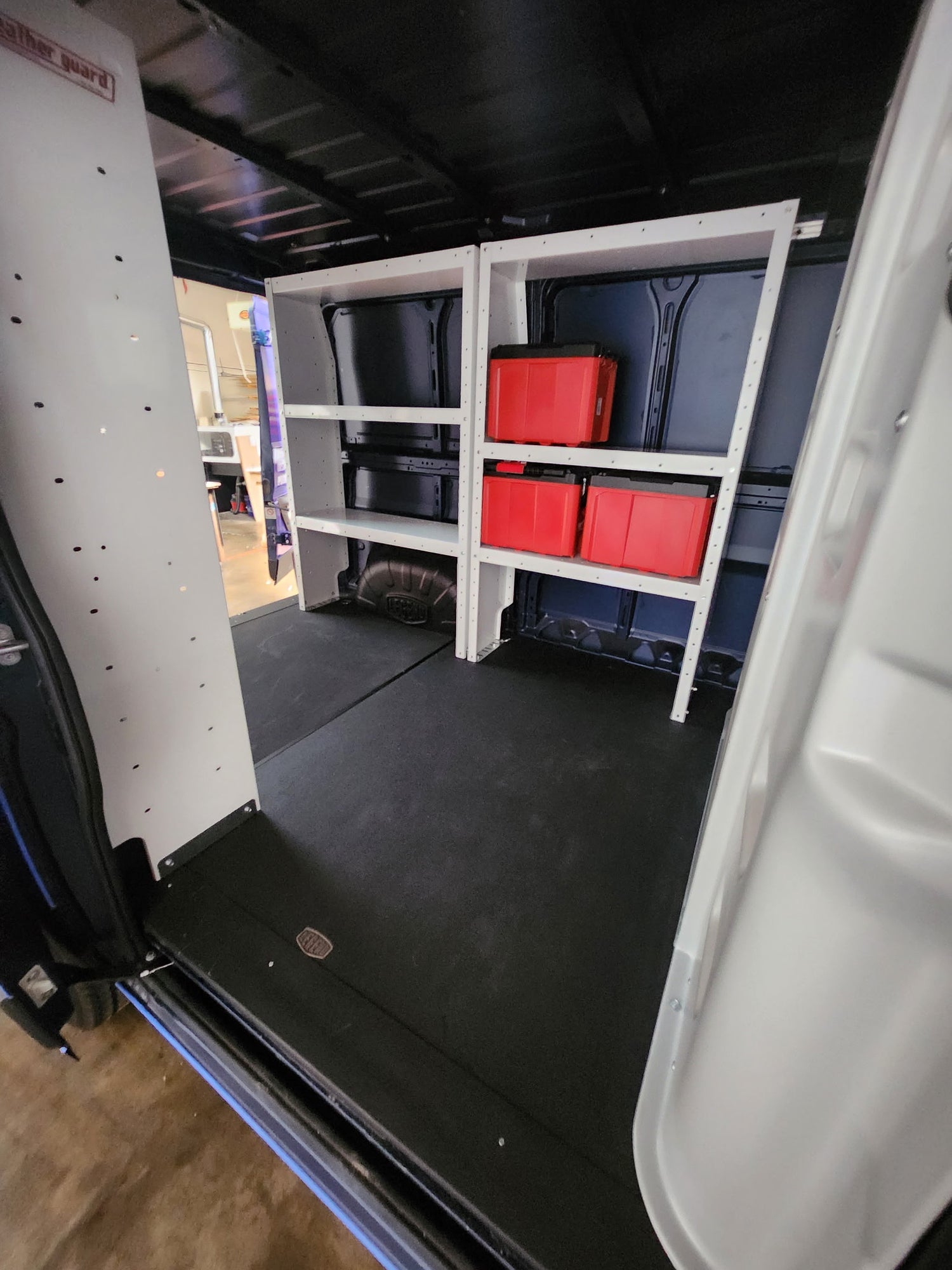 Weather Guard Van Shelving  installed by pro fleet upfitters in a ram pro master 